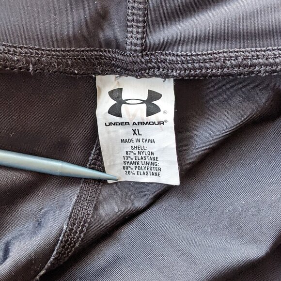 Under Armour black capri leggings with neon green accents - Picture 4 of 11